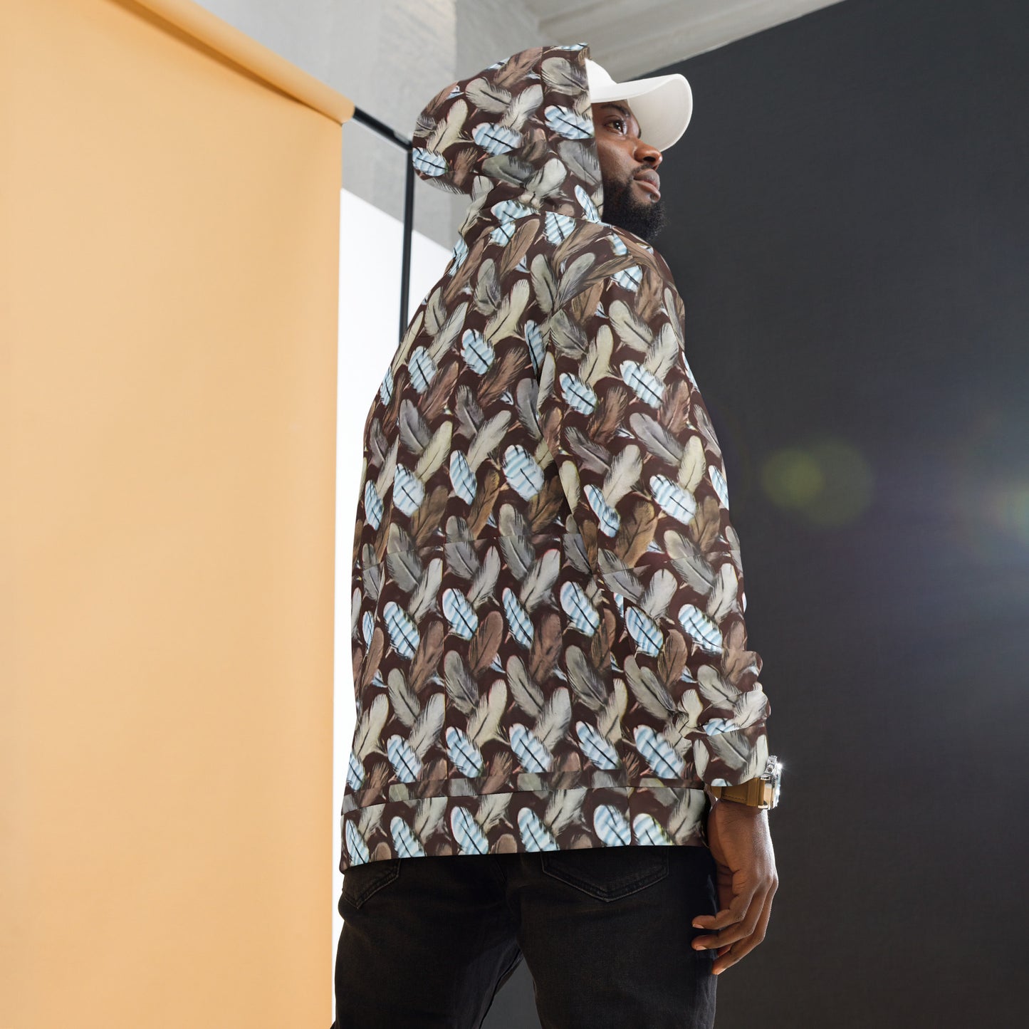 Feather Mark unisex hoodie with all-over feather design, soft fleece interior, inspired by Jackie, Shadow, Sunny, and Gizmo from Big Bear Valley.