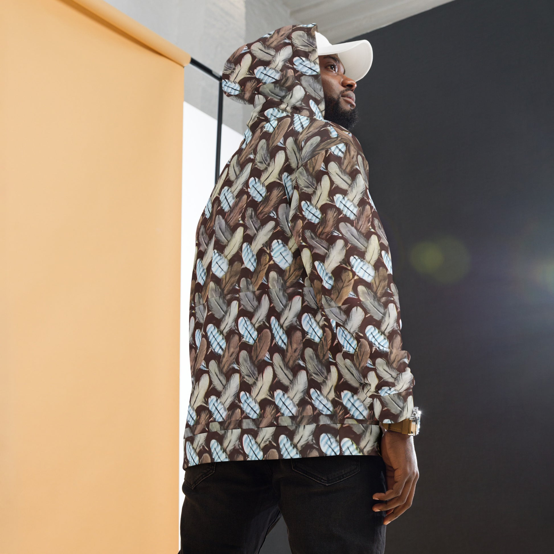 Feather Mark unisex hoodie with all-over feather design, soft fleece interior, inspired by Jackie, Shadow, Sunny, and Gizmo from Big Bear Valley.