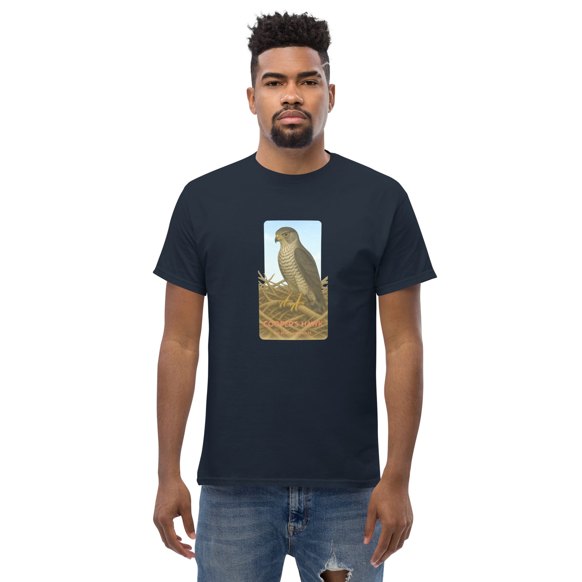 100% cotton navy t-shirt with a striking illustration of a Cooper's Hawk on a nest gazing out over Big Bear Lake.