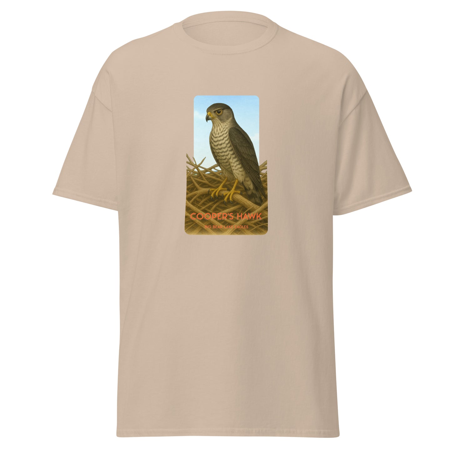 100% cotton sand t-shirt with a striking illustration of a Cooper's Hawk on a nest gazing out over Big Bear Lake.