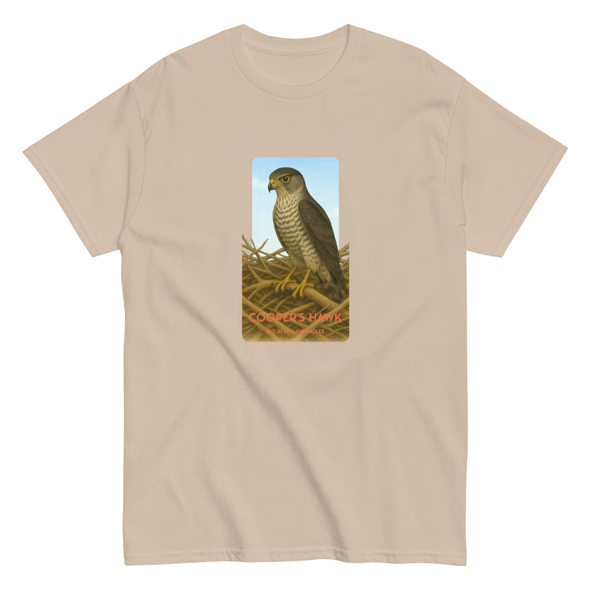100% cotton sand t-shirt with a striking illustration of a Cooper's Hawk on a nest gazing out over Big Bear Lake.
