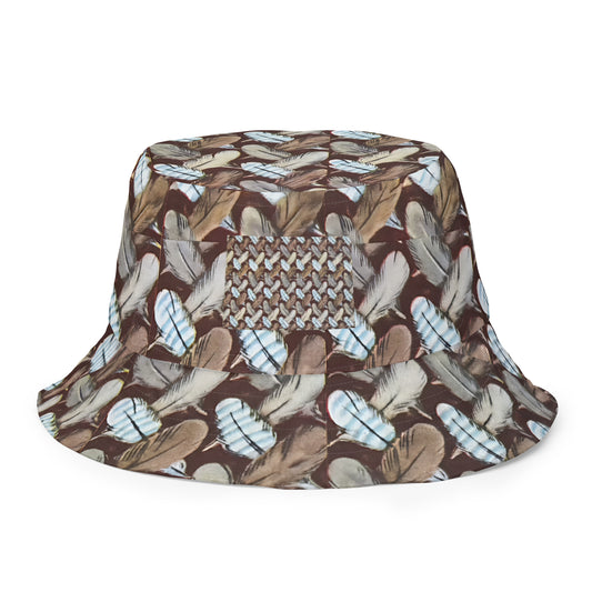 Bucket hat featuring Feather Mark logo on one side and a bold eagle-inspired print on the other, honoring Jackie and Shadow of Big Bear Lake