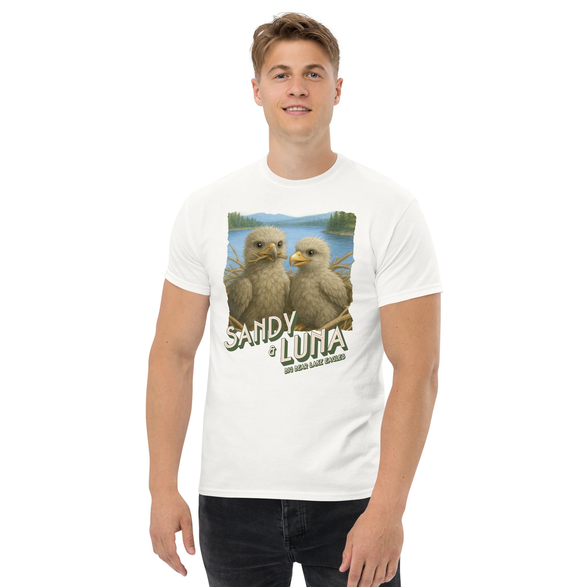 Person wearing a white t-shirt with two eaglets and text on a white background