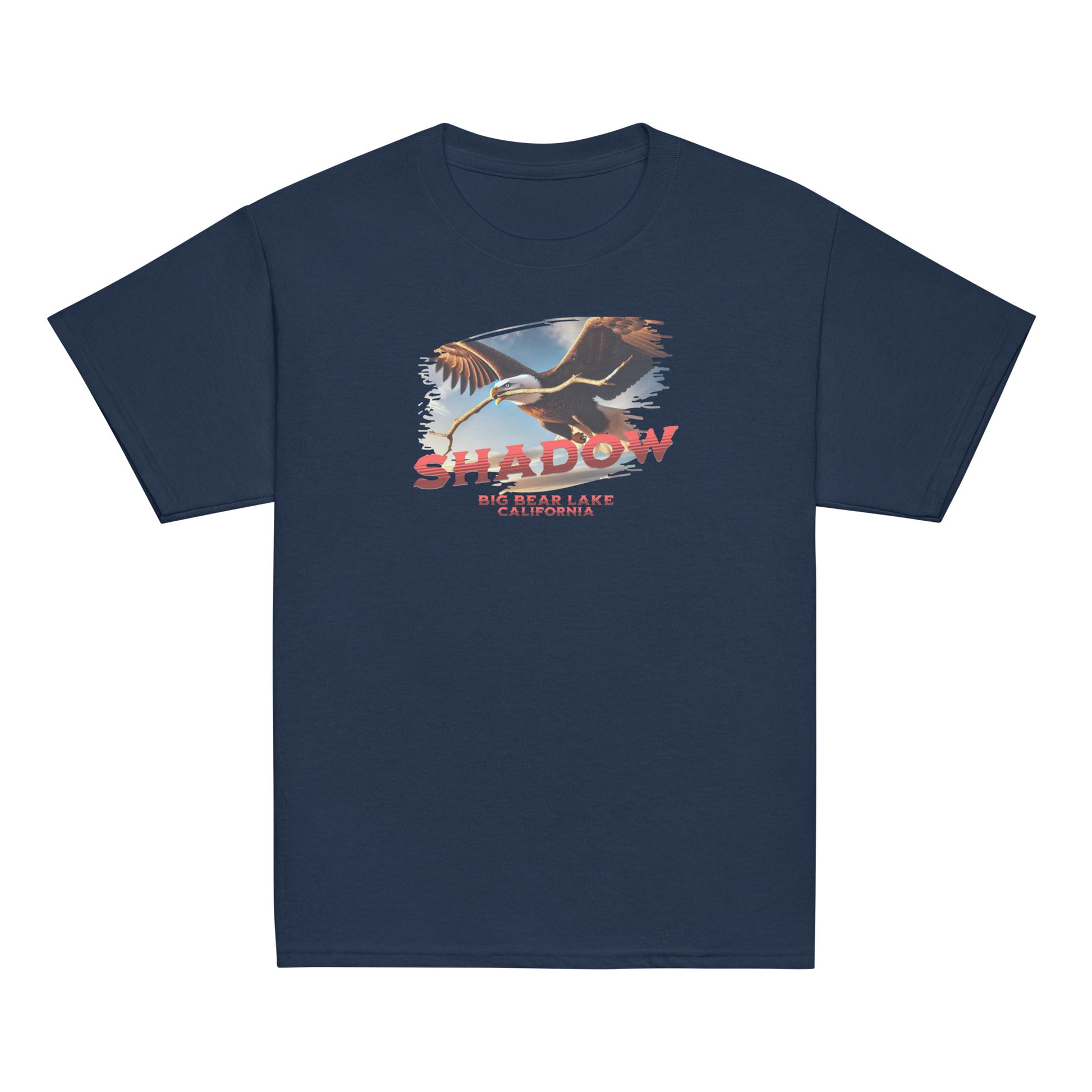 Youth t-shirt featuring Shadow the bald eagle flying with a stick in his beak over Big Bear Valley, inspired by his nest-building for Jackie.